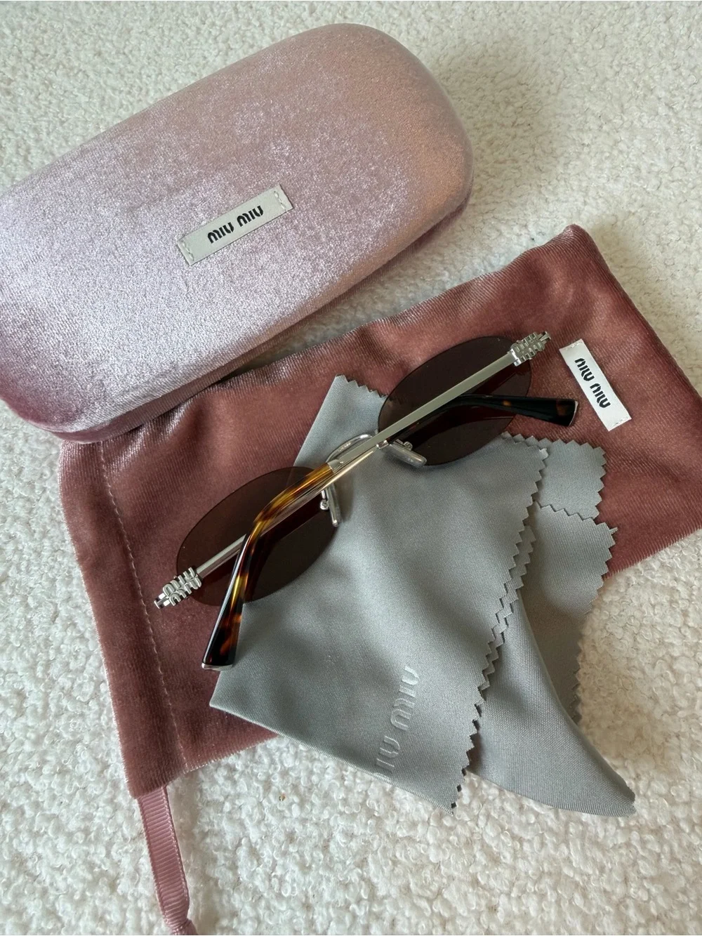 MIU MIU oval brown and silver sunglasses